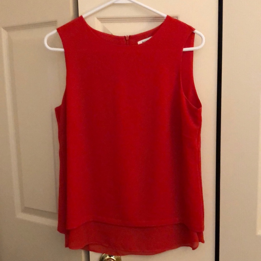 Red sleeveless top